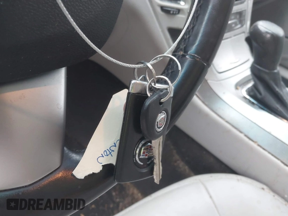 2012 Cadillac CTS with VIN 1G6DA5E56C0143588, listed as a IAAI auction lot 41416131 with 230,310 mi miles and . Bid and sale history available at DreamBid. Image 11.