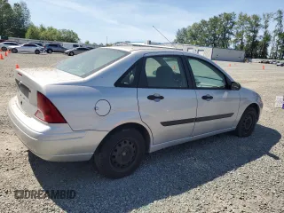 2001 Ford Focus LX с VIN 1FAFP33P61W357400, выставлен на аукционе Copart как лот 59637385 с пробегом 102 279 миль миль и Чистый • Clean title. История ставок и продаж доступна на DreamBid. Изображение 3.