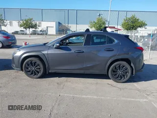 2022 Lexus UX with VIN JTHX3JBH6N2056436, listed as a IAAI auction lot 41856541 with 12,815 mi miles. Bid and sale history available at carsss.com. Image 14.