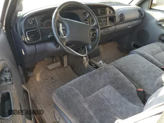 1999 Dodge Ram 2500 with VIN 3B7KF23Z6XG236963, listed as a Copart auction lot 69101424 with 0 mi miles and Salvage Title. Bid and sale history available at carsss.com. Image 8.