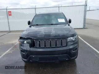 2018 Jeep Grand Cherokee Laredo with VIN 1C4RJFAG7JC468391, listed as a IAAI auction lot 42010443 with 91,585 mi miles and . Bid and sale history available at DreamBid. Image 12.