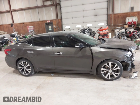 2016 Nissan Maxima Platinum with VIN 1N4AA6AP3GC404618, listed as a IAAI auction lot 42372458 with 133,968 mi miles and . Bid and sale history available at DreamBid. Image 13.