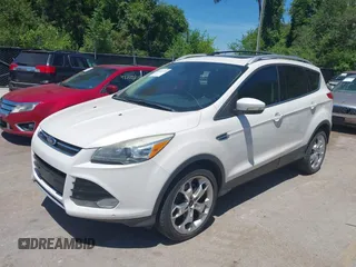 2013 Ford Escape Titanium with VIN 1FMCU9J94DUD32777, listed as a IAAI auction lot 42683798 with 197,857 mi miles and . Bid and sale history available at DreamBid. Image 2.