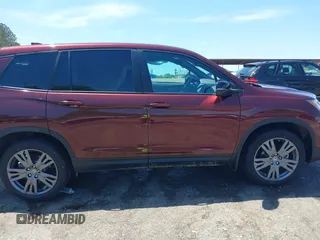 2019 Honda Passport EX-L with VIN 5FNYF7H59KB009956, listed as a IAAI auction lot 42021317 with 58,121 mi miles and . Bid and sale history available at DreamBid. Image 13.