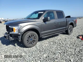 2018 Ford F-150 XL with VIN 1FTEW1CPXJKC26636, listed as a Copart auction lot 61426755 with 47,137 mi miles and Salvage title. Bid and sale history available at DreamBid. Image 1.
