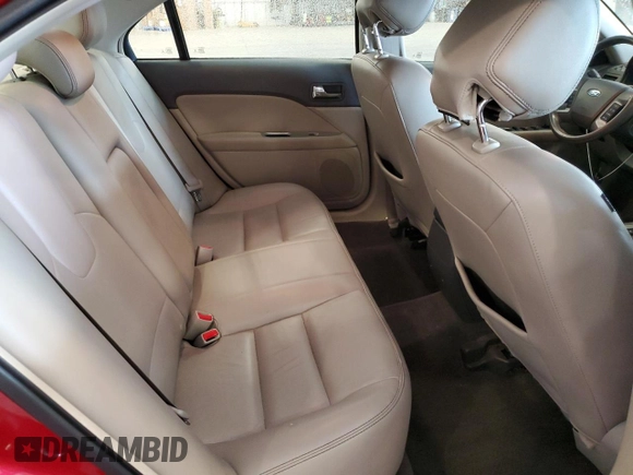 2012 Ford Fusion SEL z VIN 3FAHP0JG0CR265666, wystawiony jako Copart lot #62860355 z przebiegiem 126 812 mil mil oraz Szkoda całkowita • Salvage title. Historia ofert i sprzedaży dostępna na DreamBid. Obrazek 10.