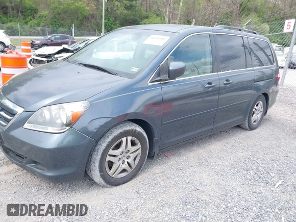 2005 Honda Odyssey EX with VIN 5FNRL38495B004614, listed as a IAAI auction lot 42128185 with 230,247 mi miles. Bid and sale history available at carsss.com. Image 2.