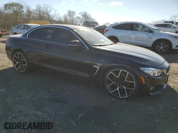 2015 BMW 4 Series 428i with VIN WBA3V7C56FP772739, listed as a Copart auction lot 82468624 with 50,320 mi miles and Salvage Title. Bid and sale history available at carsss.com. Image 4.