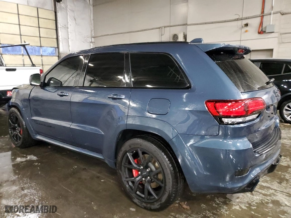 2021 Jeep Grand Cherokee SRT with VIN 1C4RJFDJ2MC606186, listed as a Copart auction lot 79479704 with 39,349 mi miles and Salvage Title. Bid and sale history available at carsss.com. Image 2.