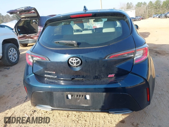 2021 Toyota Corolla Hatchback SE with VIN JTND4MBE9M3114388, listed as a IAAI auction lot 41796303 with 58,656 mi miles. Bid and sale history available at carsss.com. Image 16.
