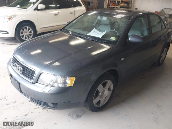2004 Audi A4 1.8T with VIN WAULC68E04A055889, listed as a IAAI auction lot 41986309 with 124,598 mi miles. Bid and sale history available at carsss.com. Image 2.