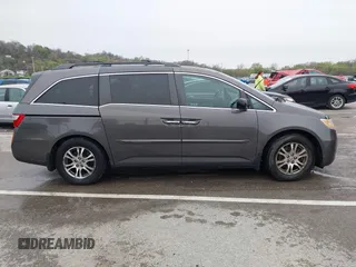 2012 Honda Odyssey EX-L with VIN 5FNRL5H6XCB032366, listed as a IAAI auction lot 41943625 with 73,236 mi miles and . Bid and sale history available at carsss.com. Image 13.