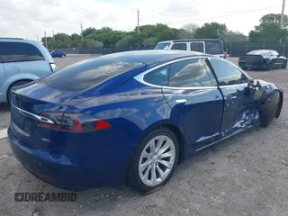 2017 Tesla Model S 100D with VIN 5YJSA1E28HF217489, listed as a IAAI auction lot 42128388 with Not provided miles and . Bid and sale history available at DreamBid. Image 4.