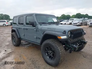 2024 Jeep Wrangler Sport S with VIN 1C4PJXDG1RW261286, listed as a IAAI auction lot 42219560 with 10,893 mi miles and . Bid and sale history available at DreamBid. Image 1.