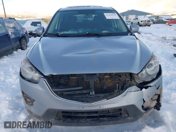 2016 Mazda CX-5 Touring with VIN JM3KE4CY9G0904000, listed as a IAAI auction lot 41186630 with 73,900 mi miles. Bid and sale history available at carsss.com. Image 12.