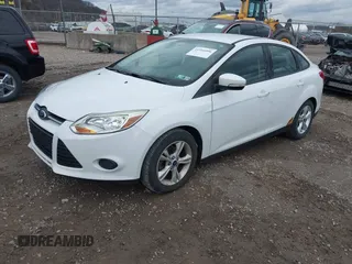 2014 Ford Focus SE with VIN 1FADP3F29EL424571, listed as a IAAI auction lot 41951096 with 88,486 mi miles. Bid and sale history available at carsss.com. Image 2.