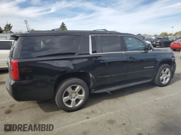 2019 Chevrolet Suburban LS z VIN 1GNSCGKC2KR297407, wystawiony jako Copart lot #75224194 z przebiegiem 93 562 mil mil oraz Szkoda całkowita • Salvage title. Historia ofert i sprzedaży dostępna na DreamBid. Obrazek 3.