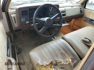1994 GMC Sierra 1500 z VIN 2GTEK19K3R1574913, wystawiony jako Copart lot #55939635 z przebiegiem 191 240 mil mil oraz Szkoda całkowita • Salvage title. Historia ofert i sprzedaży dostępna na DreamBid. Obrazek 8.