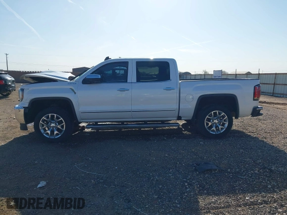 2017 GMC Sierra 1500 SLT z VIN 3GTU2NEC0HG304187, wystawiony jako IAAI lot #41973007 z przebiegiem Nie podano mil oraz . Historia ofert i sprzedaży dostępna na DreamBid. Obrazek 14.