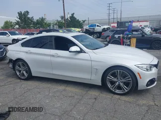 2017 BMW 4 Series 430i with VIN WBA4F7C54HG437984, listed as a IAAI auction lot 42429305 with 112,591 mi miles and . Bid and sale history available at DreamBid. Image 14.