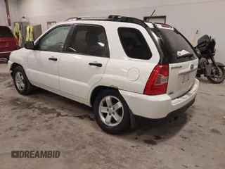 2010 Kia Sportage LX with VIN KNDKGCA35A7718764, listed as a IAAI auction lot 41512368 with 122,420 mi miles and . Bid and sale history available at carsss.com. Image 3.