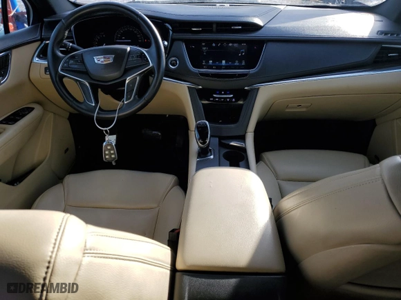 2017 Cadillac XT5 FWD with VIN 1GYKNARS7HZ312323, listed as a Copart auction lot 43018035 with 188,450 mi miles and Salvage Title. Bid and sale history available at carsss.com. Image 8.