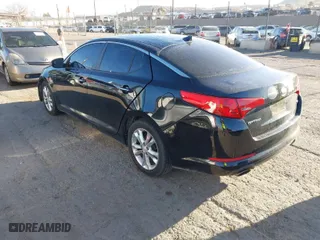 2013 Kia Optima LX with VIN 5XXGM4A72DG141842, listed as a IAAI auction lot 41758919 with 153,114 mi miles. Bid and sale history available at carsss.com. Image 3.