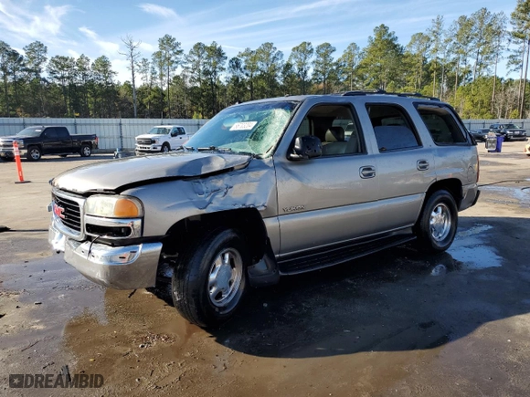 2003 GMC Yukon SLT with VIN 1GKEC13ZX3R243204, listed as a Copart auction lot 86703204 with 0 mi miles and Salvage Title. Bid and sale history available at carsss.com. Image 1.