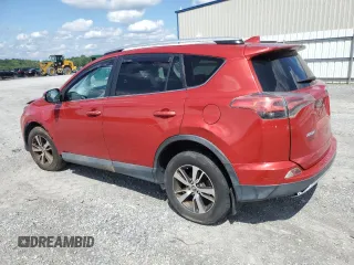 2016 Toyota RAV4 XLE with VIN 2T3RFREV7GW421217, listed as a Copart auction lot 64249145 with 133,722 mi miles and Clean title. Bid and sale history available at DreamBid. Image 2.