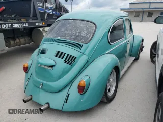 1969 Volkswagen Beetle with VIN 119682637V, listed as a Copart auction lot 70315404 with 59,148 mi miles and Salvage Title. Bid and sale history available at DreamBid. Image 3.