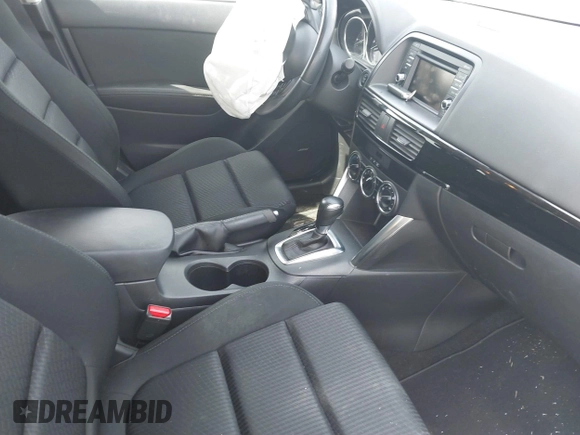 2015 Mazda CX-5 Touring with VIN JM3KE2CY2F0530204, listed as a IAAI auction lot 41788921 with 50,827 mi miles. Bid and sale history available at carsss.com. Image 5.