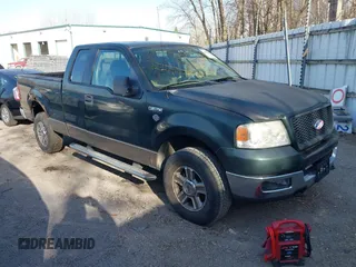 2005 Ford F-150 XLT with VIN 1FTPX14505FB72622, listed as a IAAI auction lot 41823532 with 165,918 mi miles. Bid and sale history available at carsss.com. Image 1.