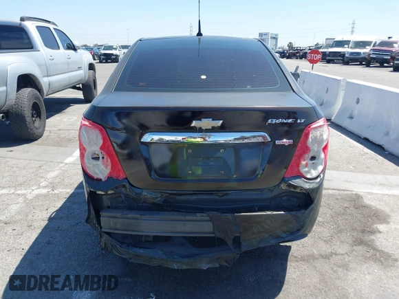 2014 Chevrolet Sonic LT with VIN 1G1JC5SB7E4146444, listed as a IAAI auction lot 42014386 with 85,122 mi miles and . Bid and sale history available at DreamBid. Image 16.
