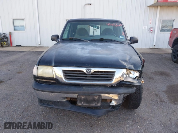 1999 Mazda B-Series 2WD Truck SE with VIN 4F4YR16V8XTM09770, listed as a IAAI auction lot 41416620 with 245,604 mi miles. Bid and sale history available at carsss.com. Image 13.
