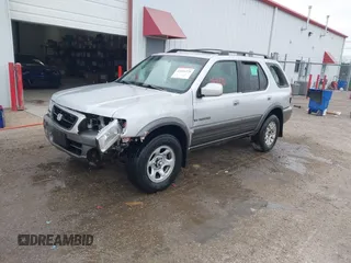 2001 Honda Passport LX z VIN 4S6CK58W714414399, wystawiony jako IAAI lot #41641270 z przebiegiem 203 093 mil mil oraz . Historia ofert i sprzedaży dostępna na DreamBid. Obrazek 2.
