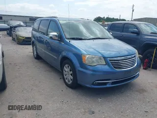 2011 Chrysler Town & Country Touring-L with VIN 2A4RR8DG2BR799141, listed as a IAAI auction lot 42058383 with 165,548 mi miles. Bid and sale history available at carsss.com. Image 1.