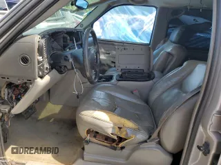 2004 Chevrolet Suburban LT with VIN 1GNEC16Z24J118695, listed as a Copart auction lot 52744505 with 306,940 mi miles and Salvage title. Bid and sale history available at DreamBid. Image 7.