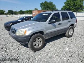 2003 Jeep Grand Cherokee Laredo with VIN 1J4GW48S23C513287, listed as a Copart auction lot 50515055 with 251,806 mi miles and Salvage Title. Bid and sale history available at carsss.com. Image 1.