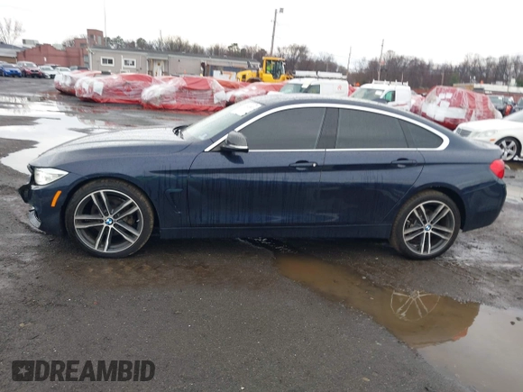 2016 BMW 4 Series 428i xDrive with VIN WBA4C9C59GG137067, listed as a IAAI auction lot 41913733 with 104,378 mi miles and . Bid and sale history available at carsss.com. Image 14.