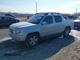 2009 Honda Ridgeline RTL with VIN 2HJYK16569H002832, listed as a IAAI auction lot 41683669 with 154,220 mi miles and . Bid and sale history available at DreamBid. Image 2.