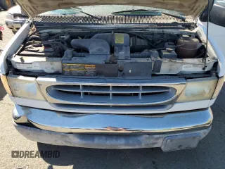 1999 Ford Econoline Wagon XL z VIN 1FBSS31SXXHB17170, wystawiony jako Copart lot #70482974 z przebiegiem 86 575 mil mil oraz Czysty tytuł • Clean title. Historia ofert i sprzedaży dostępna na DreamBid. Obrazek 12.