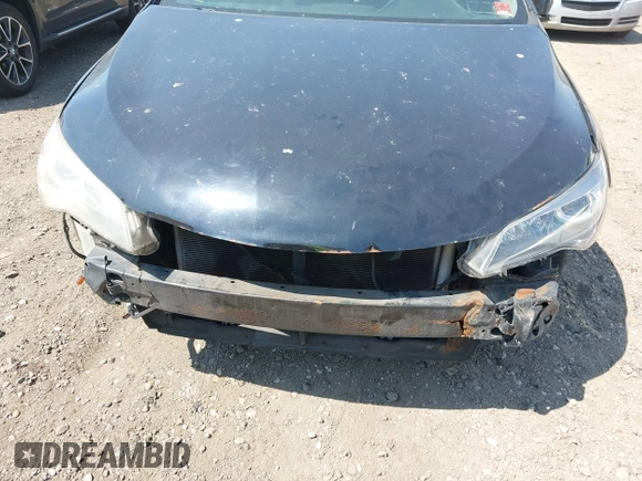 2015 Toyota Camry XLE z VIN 4T1BF1FK4FU933984, wystawiony jako IAAI lot #42121695 z przebiegiem Nie podano mil oraz . Historia ofert i sprzedaży dostępna na DreamBid. Obrazek 11.