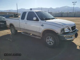 1998 Ford F-150 with VIN 1FTZX18W3WNA25682, listed as a Copart auction lot 47494755 with 197,389 mi miles and Salvage title. Bid and sale history available at DreamBid. Image 4.