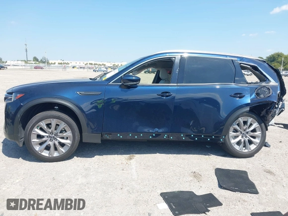 2024 Mazda CX-90 Premium Plus with VIN JM3KKEHD8R1186750, listed as a IAAI auction lot 41795353 with 5,144 mi miles and . Bid and sale history available at DreamBid. Image 14.
