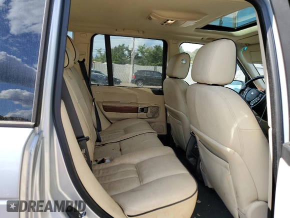 2010 Land Rover Range Rover HSE z VIN SALME1D4XAA318847, wystawiony jako Copart lot #84735474 z przebiegiem 184 777 mil mil oraz Szkoda całkowita • Salvage title. Historia ofert i sprzedaży dostępna na DreamBid. Obrazek 11.