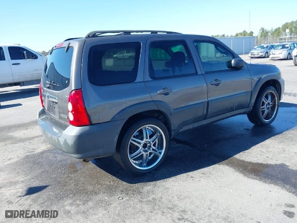2006 Mazda Tribute i with VIN 4F2YZ02Z66KM05605, listed as a IAAI auction lot 41508057 with 266,708 mi miles. Bid and sale history available at carsss.com. Image 4.