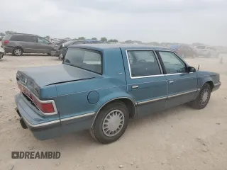 1993 Dodge Dynasty LE z VIN 1B3XC56R3PD124521, wystawiony jako Copart lot #51825725 z przebiegiem 94 336 mil mil oraz Szkoda całkowita • Salvage title. Historia ofert i sprzedaży dostępna na DreamBid. Obrazek 3.