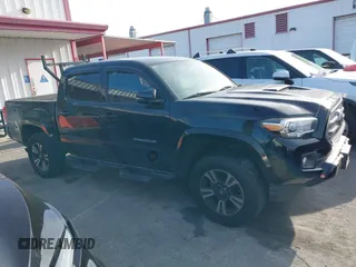 2017 Toyota Tacoma SR5 with VIN 5TFAZ5CN0HX053573, listed as a IAAI auction lot 41797867 with 102,628 mi miles and . Bid and sale history available at DreamBid. Image 14.