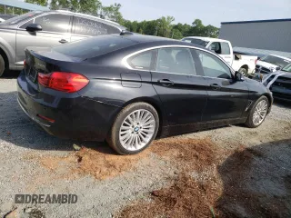 2015 BMW 4 Series 428i with VIN WBA4A5C50FD410198, listed as a Copart auction lot 55448345 with 137,042 mi miles and Clean title. Bid and sale history available at DreamBid. Image 3.