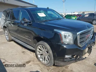 2015 GMC Yukon XL SLT z VIN 1GKS2HKC1FR244855, wystawiony jako IAAI lot #42100411 z przebiegiem 181 190 mil mil oraz . Historia ofert i sprzedaży dostępna na DreamBid. Obrazek 1.
